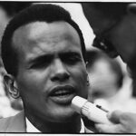 "Public Domain: Harry Belafonte at 1963 March on Washington (NARA)" by pingnews.com is marked with Public Domain Mark 1.0.