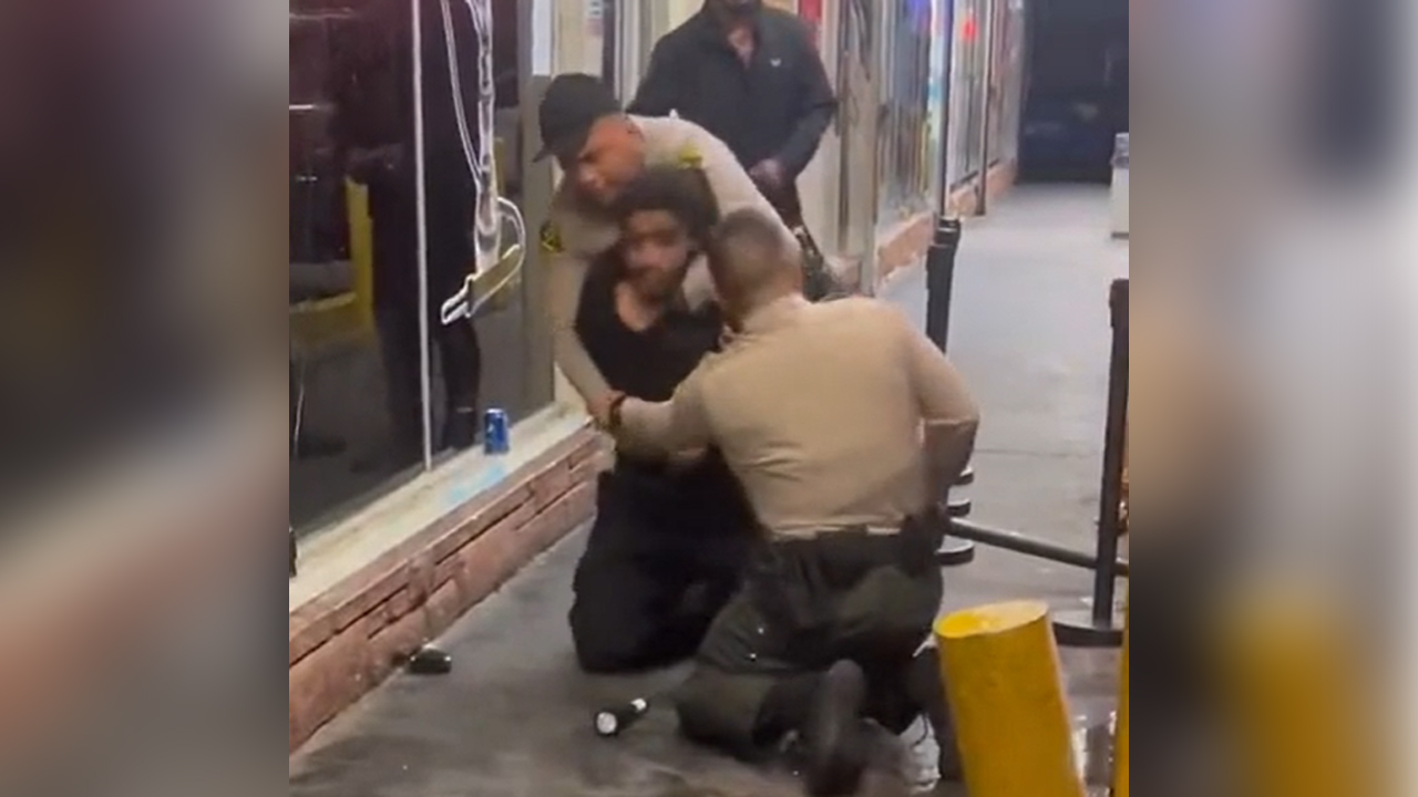 Los Angeles County sheriff's deputies were caught on camera using force arresting a man they are trying to restrain in Inglewood, California on Oct. 16, 2022. (Screenshot)