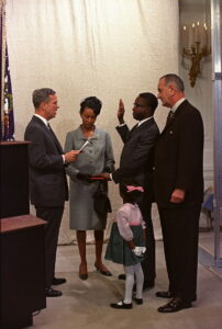 Andrew Brimmer gets sworn in as a member of the Federal Reserve Board. President Lyndon Johnson, right, Brimmer’s wife and daughter look on.(Source: Robert L. Knudsen via Wikimedia Commons)