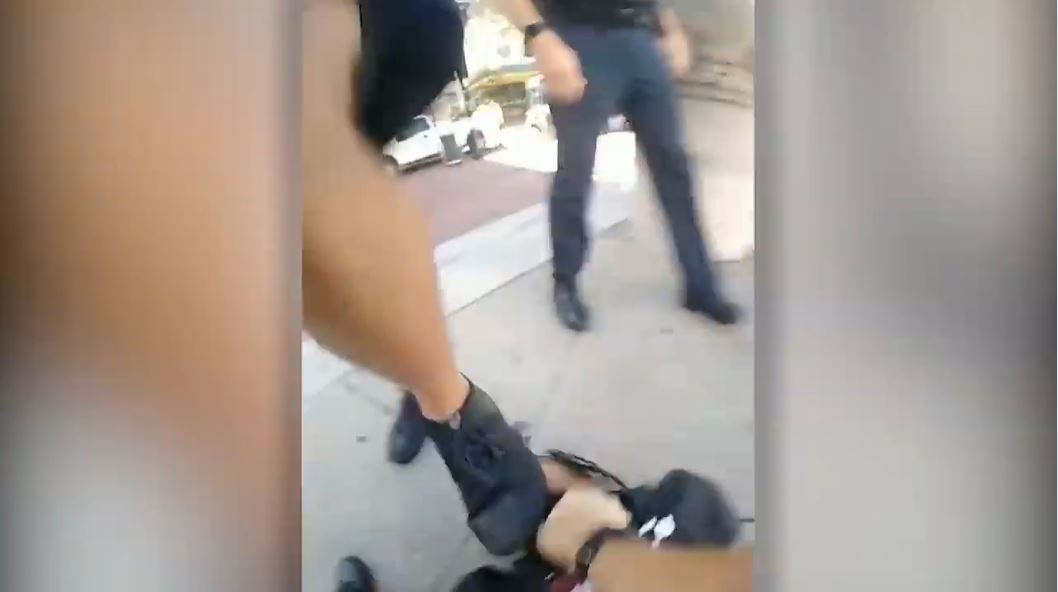 Video from police body camera showed an Indianapolis Metro Police Department Sergeant stomp a Black man in the face while he was handcuffed on the ground on Sept. 24, 2021. (Source: Indianapolis Metro Police Department)