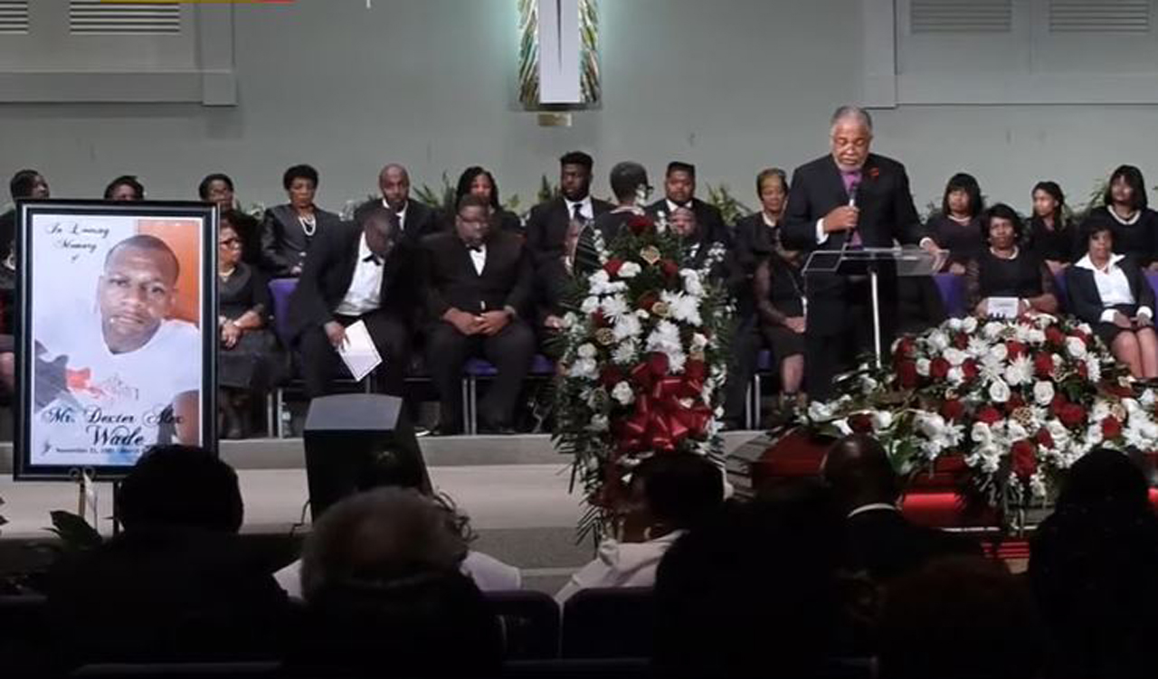 A funeral service was held in Mississippi on Monday, Nov. 20, 2023 for Dexter Wade, a 37-year-old Black man who was fatally struck by a police SUV in March. Wade's family was not notified of his death for several months. HIs body was exhumed in September after official buried his body at a pauper's cemetery. (Source: Screenshot - WJTV 12 News)