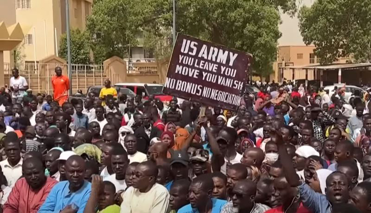 Demonstrators march in the streets in Niamey, Niger on Saturday, April 14, 2024 after the country's military government further ended a military accord with the U.S. and welcomed Russian military instructors to the country. (Source: Screenshot - Al-Jazeera)