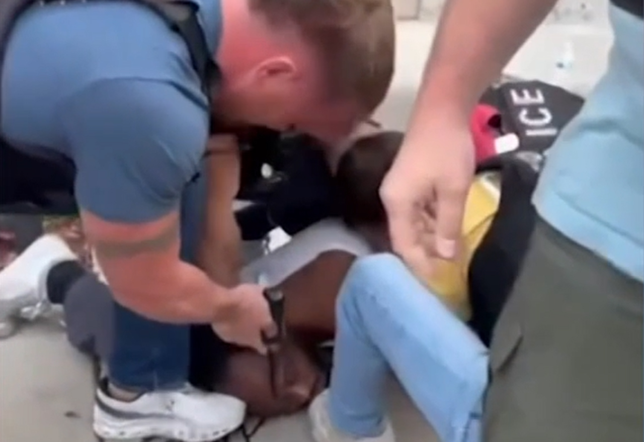 Cellphone video captured Chicago police officers holding a Black man down on the ground in Chicago on Tuesday, July 30, 2024. One of the officers is seen holding a gun to the head of the man identified as Lorenzo Williams, who has filed a lawsuit against CPD and the City of Chicago. (Source: Screenshot - WLS Chicago)