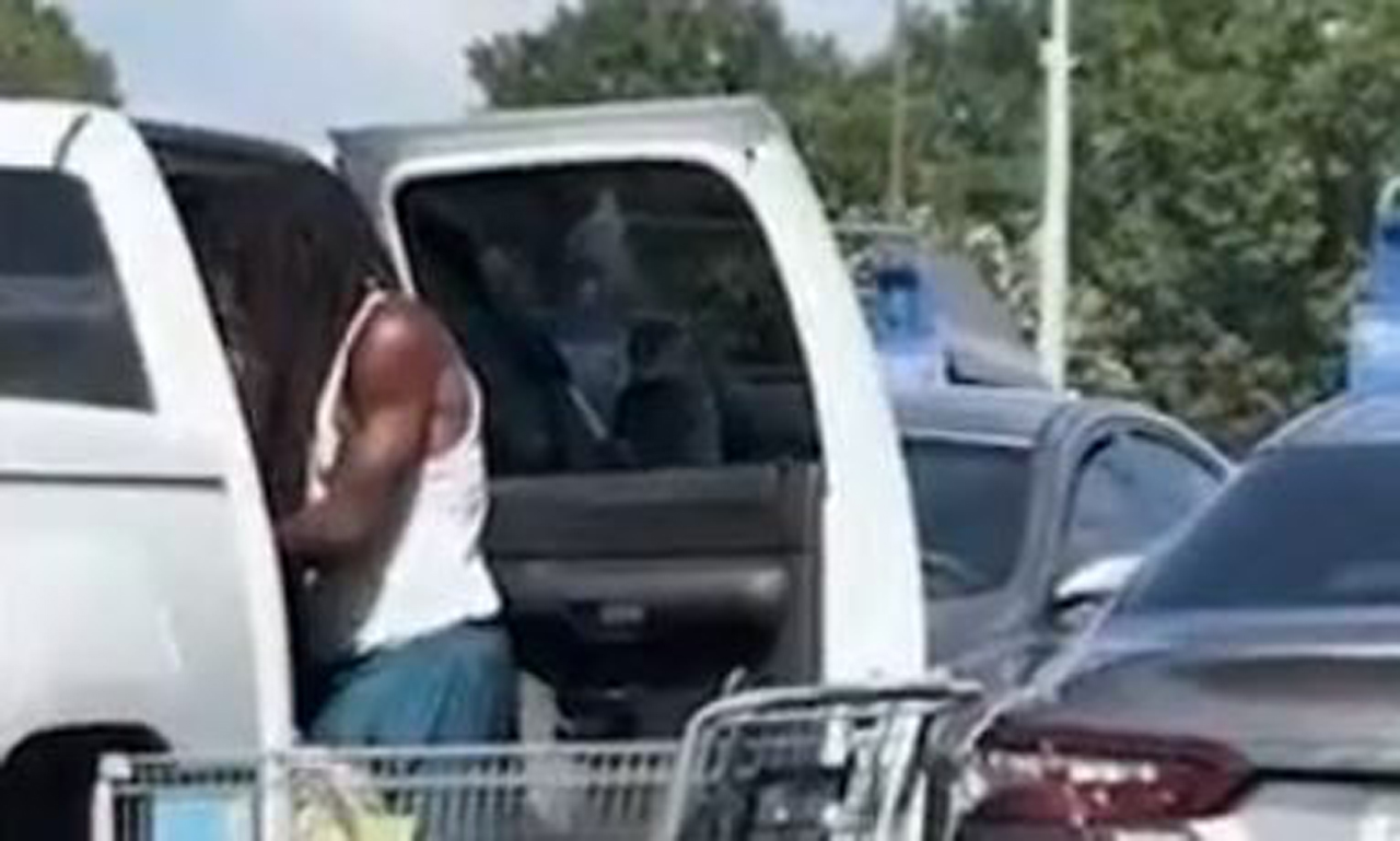 A man was seen allegedly striking a child in the back seat of a truck in a video that went viral. The man was arrested on Saturday, Aug. 10, 2024. (Source: Screenshot - FOX 5 Atlanta)