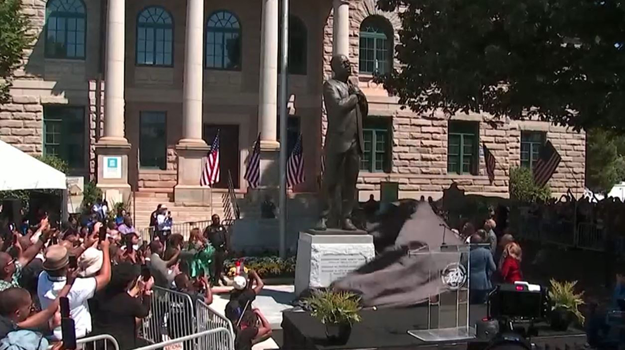 A 12-foot bronze statue of late Rep. John Lewis was unveiled during a ceremony in Decatur, Ga. on Saturday, Aug. 25, 2024. (Source: Screenshot - WANF)