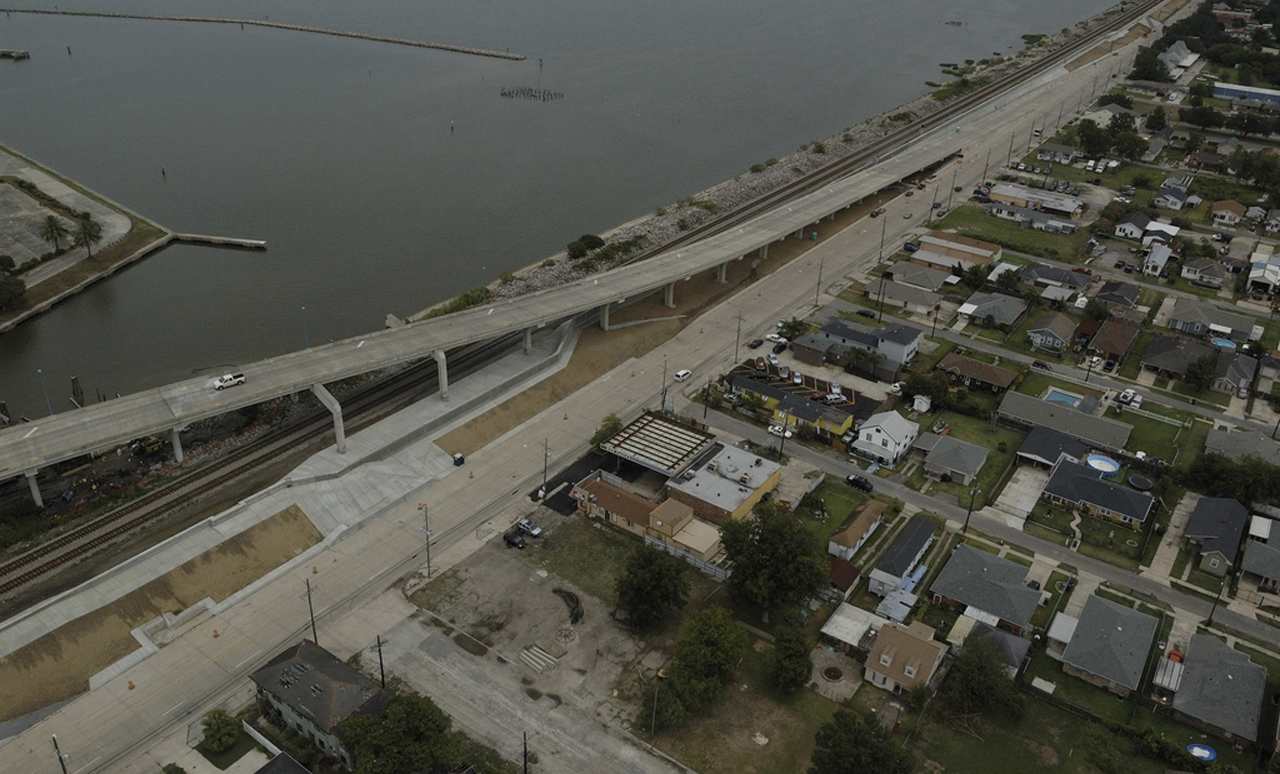 "Lakefront Airport Floodwall, New Orleans East" by USACE HQ is marked with Public Domain Mark 1.0.